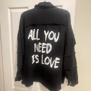 Black Shirt / jacket   with White Text on back